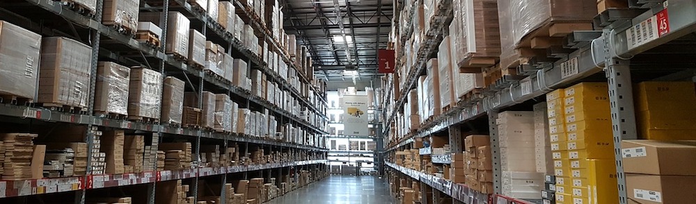 shelves filled with boxes in a warehouse